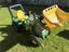 Sit on John Deere tractor and trailers Carousel 4