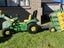 Sit on John Deere tractor and trailers Carousel 2