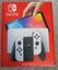 Used Nintendo Switch OLED (White) + Games + Accessories – Local Pickup Only Carousel 1