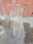 3 Large Coca-Cola and Small One and other Bottle Carousel 4