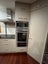 Kitchen with Granite Benchtop Carousel 7