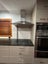 Kitchen with Granite Benchtop Carousel 8