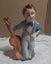 Vintage man with cello and flowers Carousel 1