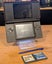 Nintendo DS Lite + Pokémon Mystery Dungeon + Mario & Sonic at the Olympic Games Carousel 5