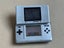 2x Silver Original Nintendo DS + R4 Cartridge Carousel 8