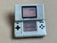 2x Silver Original Nintendo DS + R4 Cartridge Carousel 14