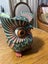 A beautiful wood carved owl with good painting. Carousel 5