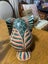 A beautiful wood carved owl with good painting. Carousel 9
