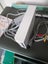Nintendo Wii + remote and controller + Wii Play Carousel 2