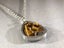 Mid-Century Jørgen Jensen Pewter and Tiger's Eye Pendant Carousel 1