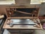 Carpenters saw box and 5 Diston handsaws. Carousel 1