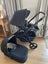 Edwards & Co Oscar in Black Luxe Tan, plus Bassinet Carousel 1