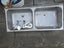 Double laundry tub with tapset Carousel 1