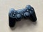 PlayStation 3 with cables and controller Carousel 3