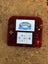Nintendo 2DS Pokemon fire red edition Carousel 1
