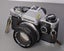 Olympus OM-10 35mm film camera with Zuiko 55mm f1.8 lens and T20 flash Carousel 3