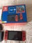 Mario Nintendo switch with dock and Mario controller Carousel 4