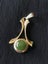 3 greenstone gold plated pendants J6 Carousel 5