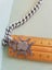 Antique silver hallmarked fob and bracelet chain.. Carousel 7