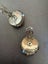 A pair of brooch Carousel 3