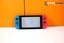 Nintendo Switch Console with Case and Nintendo Controller Carousel 2