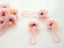 Tiny Baby Rattles, Blue or Pink 12/pk - Craft or Baby Showers Carousel 2