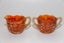 1913 orange carnival glass jugs Carousel 1