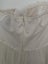 White mid-length strapless dress Carousel 7