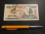 Bank Note. Cambodia. 100 1998 Temple Statue Forrest Harvesting Carousel 1