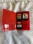 Turquoise Nintendo Switch Lite plus three games and case Carousel 8