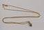 9ct Emerald & Diamond necklace Carousel 1