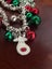 Christmas - Silver Tone Green and Red Bells Charm Stretch Bracelet Carousel 3