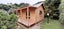 7.0 mx3.6 m assembled cabin with 1.5 mx7.0 verandah & deck. WR cedar cladding. Carousel 1