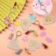 120pcs Acrylic Blank Keychain Pendant Tassels Discs Pom Poms DIY Set Carousel 9