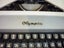 OLYMPIA PORTABLE TYPEWRITER. CASED. Carousel 5