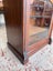An Edwardian Solid Walnut Glazed Front Cabinet Carousel 9