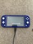 Nintendo Switch Lite+ charger, case, box and SD card Carousel 4