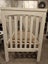 Baby Cot- almost new Carousel 9