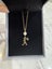 $1 RESERVE Karen Walker 9 carat Gold Necklace Carousel 1
