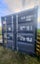 20ft container with heavy-duty shelving and workshop area Carousel 2