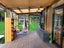 Fully Off-Grid Modern Double Loft Tiny House and Enclosed Deck + Solar Carousel 5
