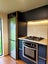 Fully Off-Grid Modern Double Loft Tiny House and Enclosed Deck + Solar Carousel 7