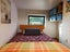 Fully Off-Grid Modern Double Loft Tiny House and Enclosed Deck + Solar Carousel 15