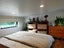 Fully Off-Grid Modern Double Loft Tiny House and Enclosed Deck + Solar Carousel 17