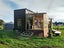 Fully Off-Grid Modern Double Loft Tiny House and Enclosed Deck + Solar Carousel 3