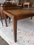 A Decorative Solid Elm Weaved Rattan Top 8 Seater Dining Table Carousel 4