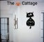 THE CATTAGE - Unique Whimsical Cat Swing Tail Clock Bring Cuteness To Any Room Carousel 1