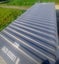 20ft container with heavy-duty shelving and workshop area Carousel 8