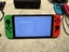 Nintendo Switch OLED Console - Neon Vibrant 7-inch OLED screen $1 RESERVE Carousel 9