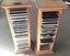CDs in 2 Wooden Holders + Phillips Stereo with 4 Speakers Carousel 1